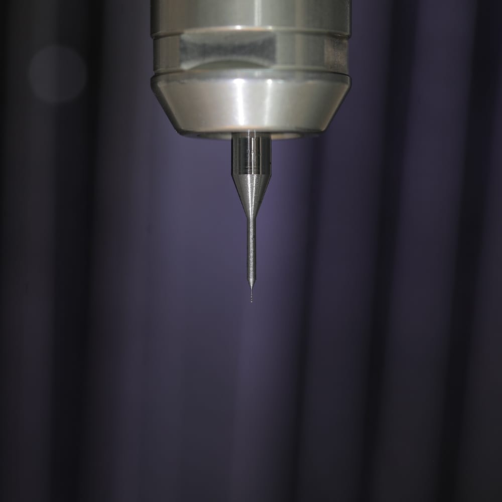20 micron micro drill held in the spindle