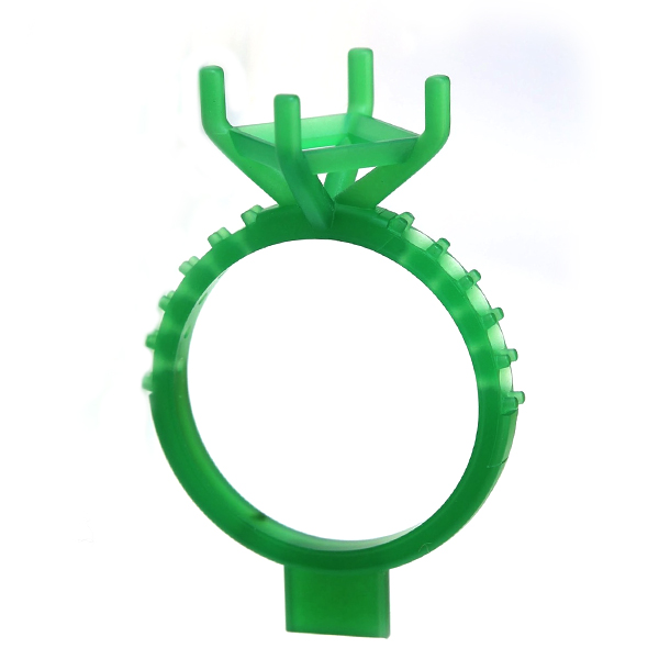 The finished ring milled in green wax